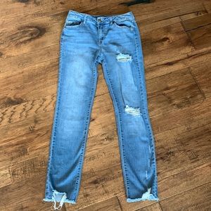 Womens distressed blue jeans in perfect condition. Brand “d.jeans” size 4.